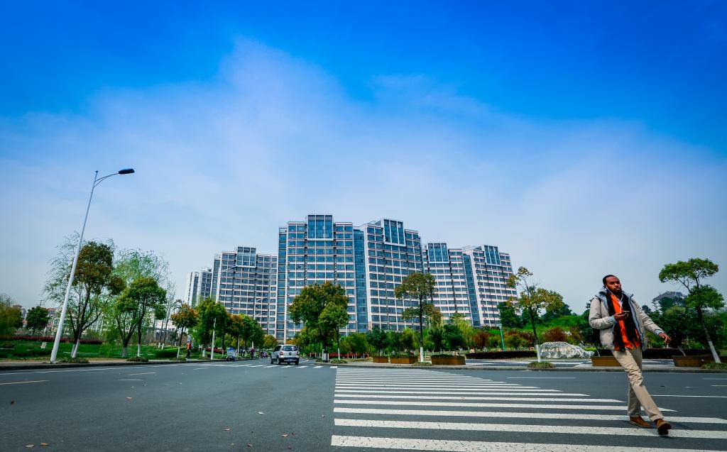 Student residence buildings and people in the Jiangsu University dormitory area