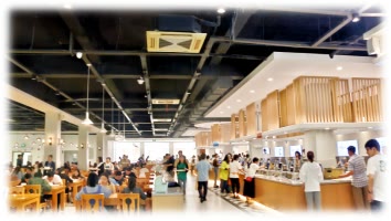 Students eating inside a Wenzhou Medical University campus cafeteria